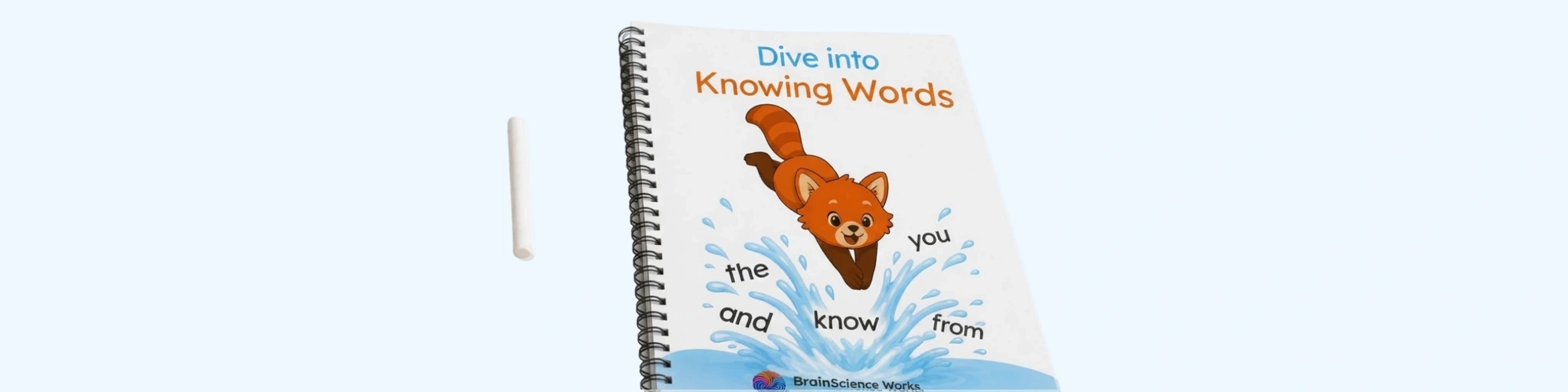 The Knowing Words workbook lying next to clay tools