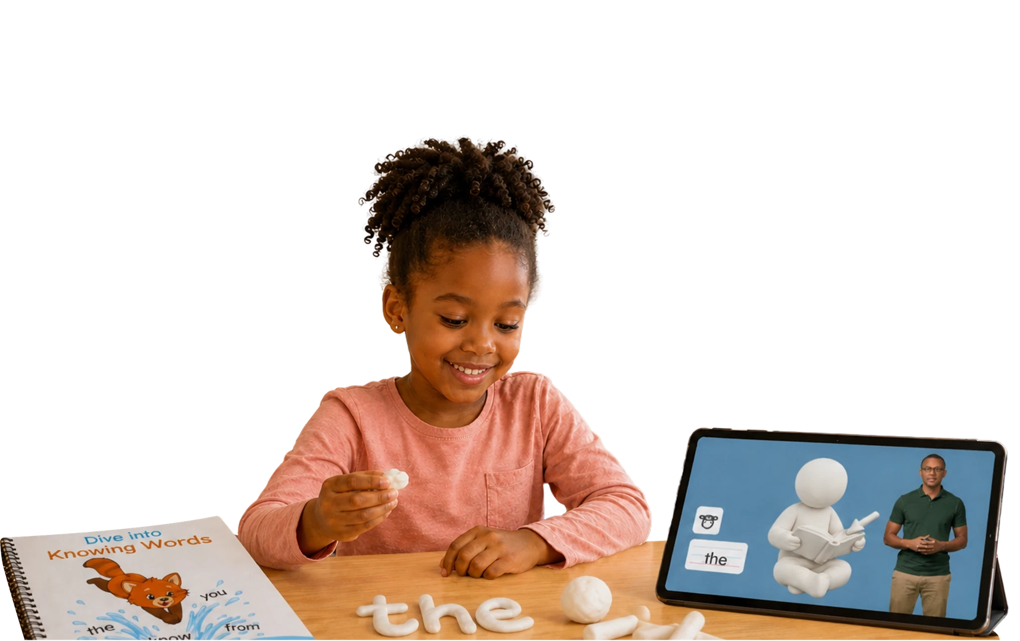 A child building a word with clay letters beside a tablet lesson