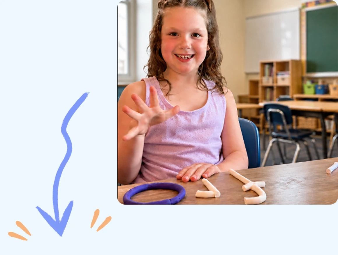 A student building a word with clay letters