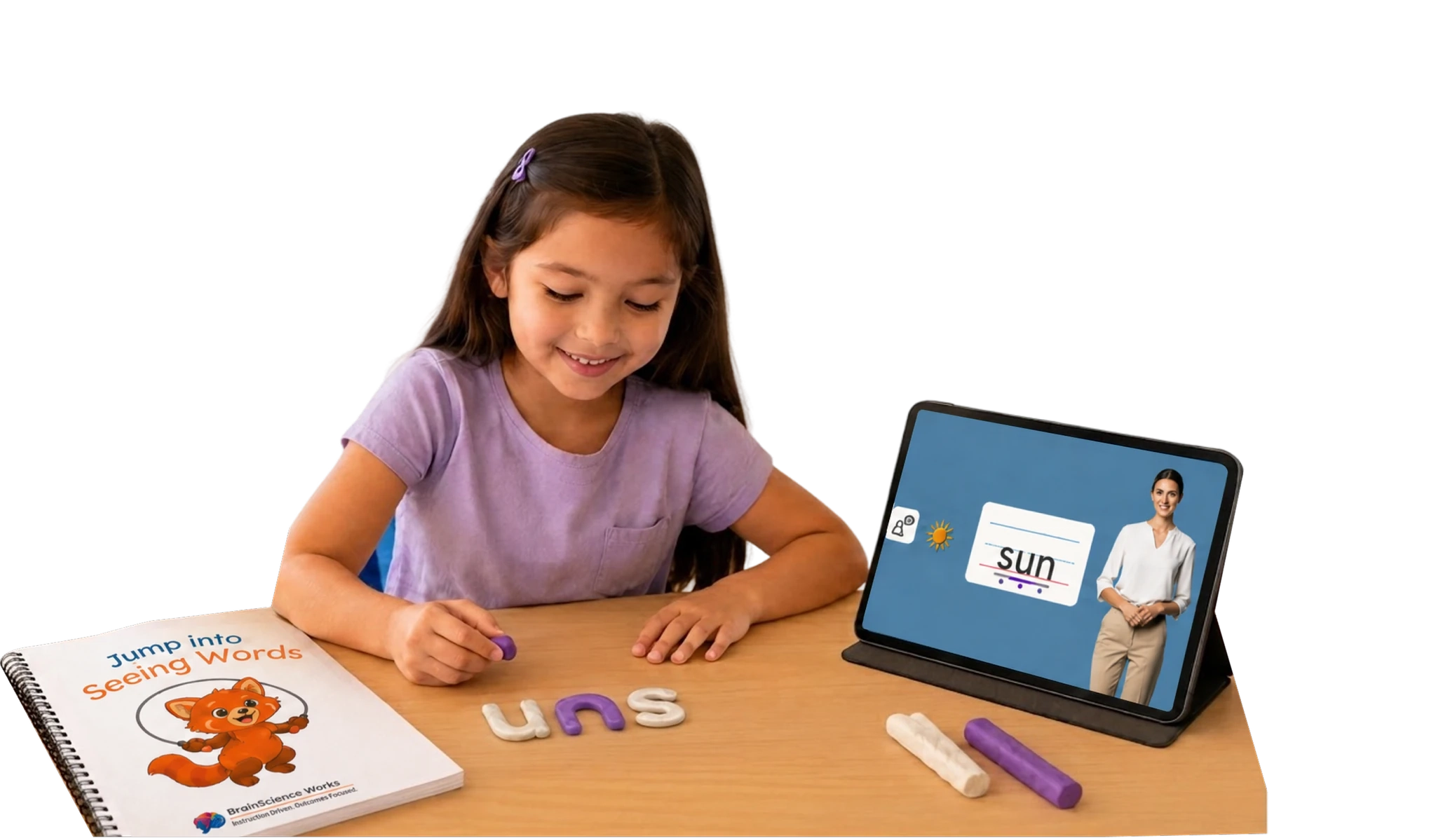 A child building a word with clay letters beside a tablet lesson