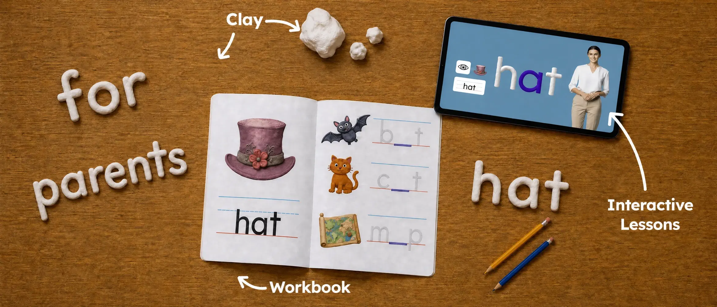 A workbook, clay letters, and a tablet running an interactive lesson on a wood desk, with clay lettering reading 'for parents'